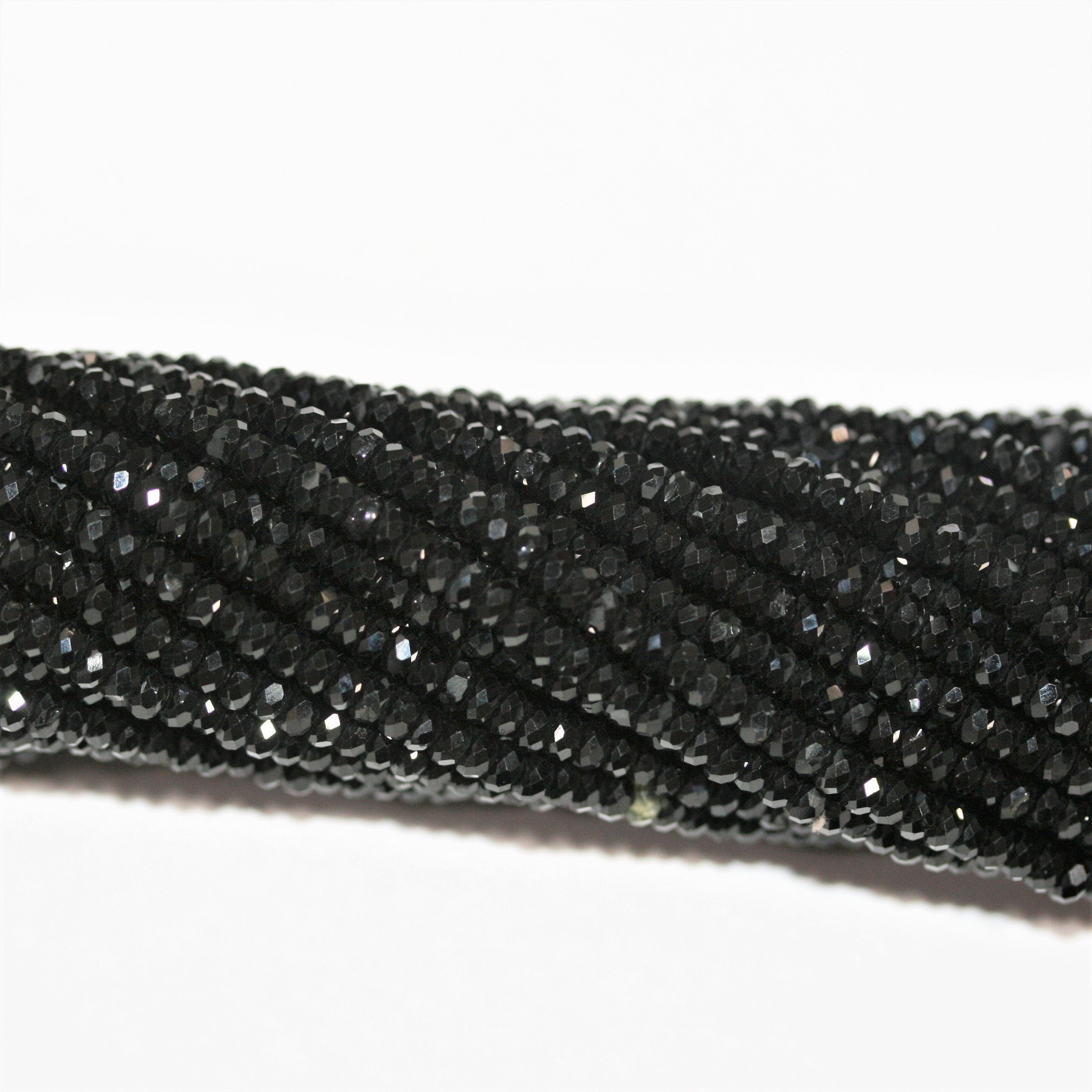 12" St Spinel Faceted Rondelle Beads 3x1,5mm.- Strand 32cm.