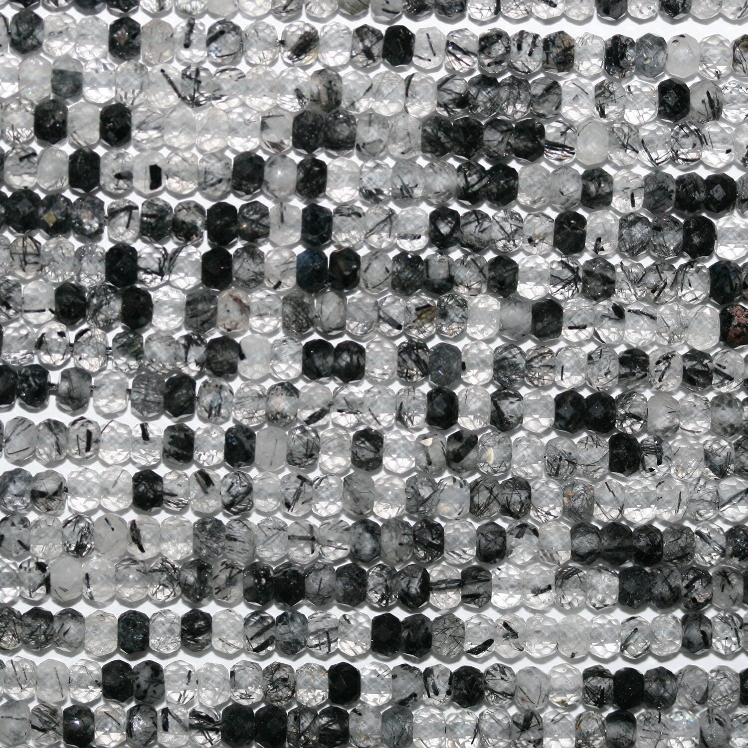 Perles rondelles à facettes en quartz tourmaliné St 15" 3x2mm.-Rig 39cm.