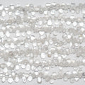 Perles en cristal de roche lisses en forme de goutte, 15 pouces (7 x 3 mm) environ. Longueur du fil : 38 cm.