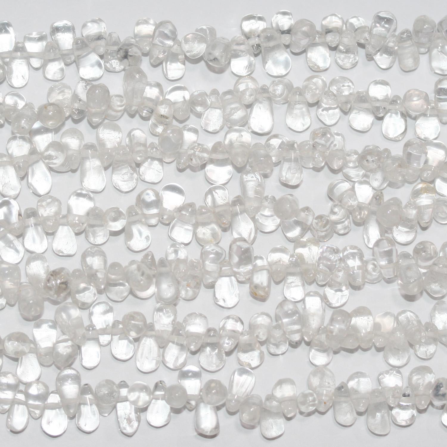 Perles en cristal de roche lisses en forme de goutte, 15 pouces (7 x 3 mm) environ. Longueur du fil : 38 cm.