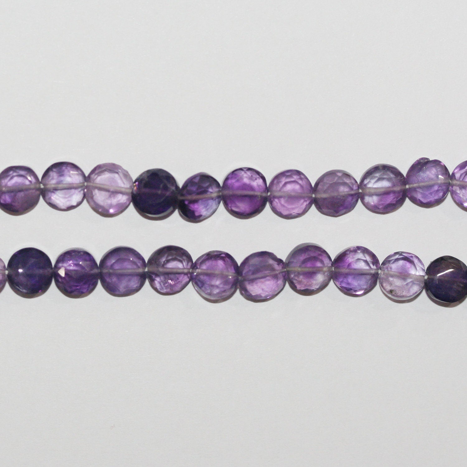 13" St Amethyst Faceted Coin Beads 6-7mm.- Strand 35cm.