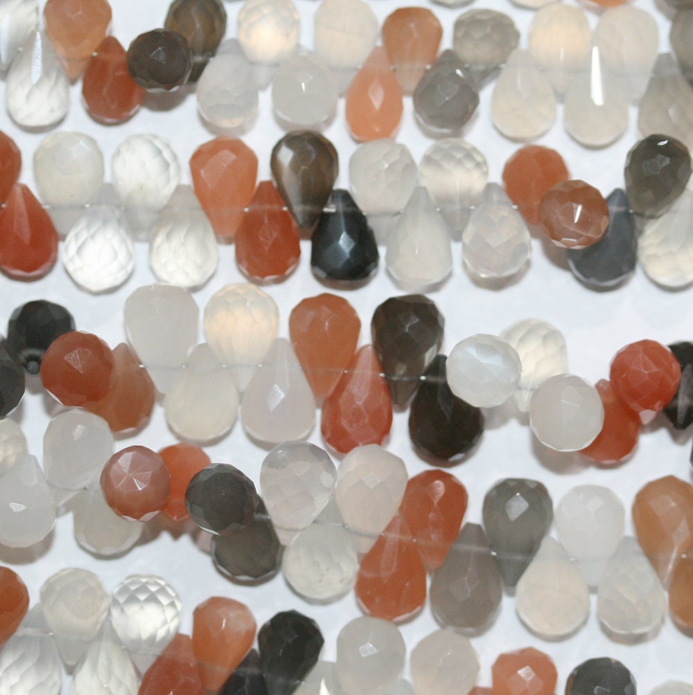 Cuentas de piedra lunar multicolor facetadas de 6" (8 x 6 mm) - Hilo de 14 cm