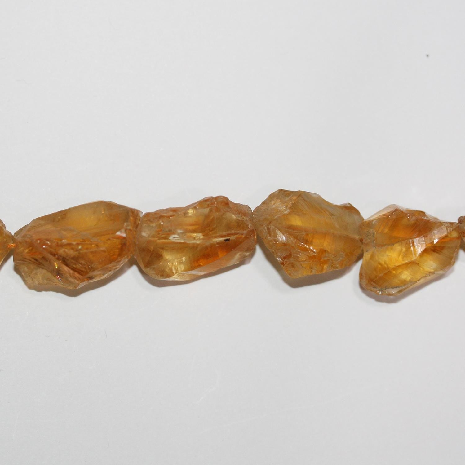 Perles de citrine St non polies, 13-18 mm environ - Longueur du fil : 38 cm