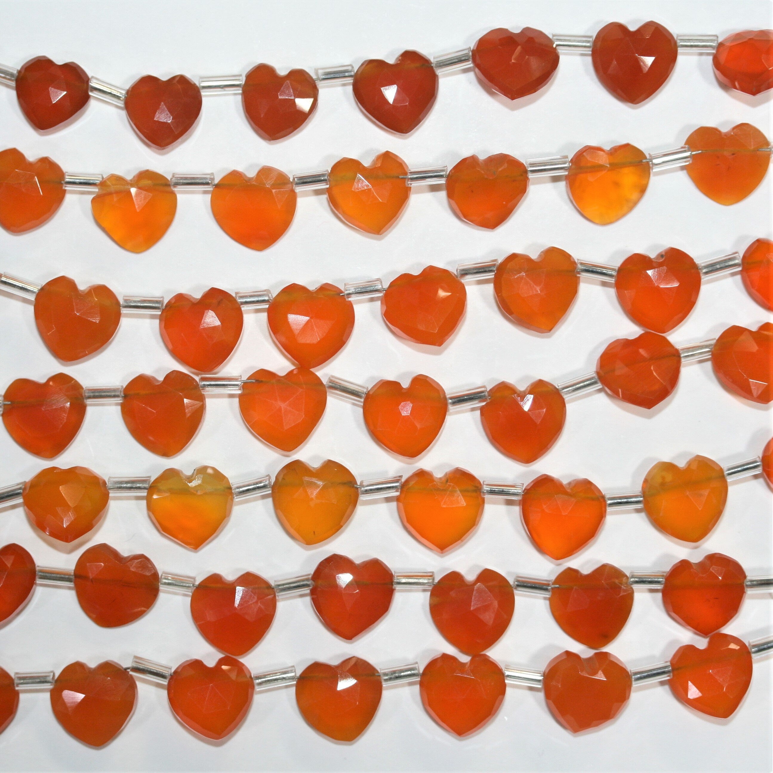 Cuentas de corazón facetadas de cornalina santa de 7", 9-10 mm, hilo de 17 cm.