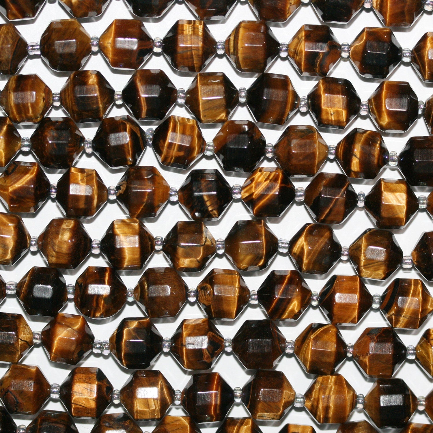 Perles cylindriques à facettes œil de tigre St 14" (10 x 9 mm) - Fil de 38 cm