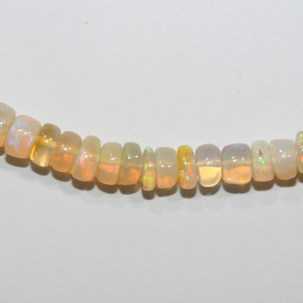 Cuentas redondas lisas de ópalo etíope de San Etiopía de 40 cm, 6 x 3 mm (aprox.). Hilo de 40 cm.