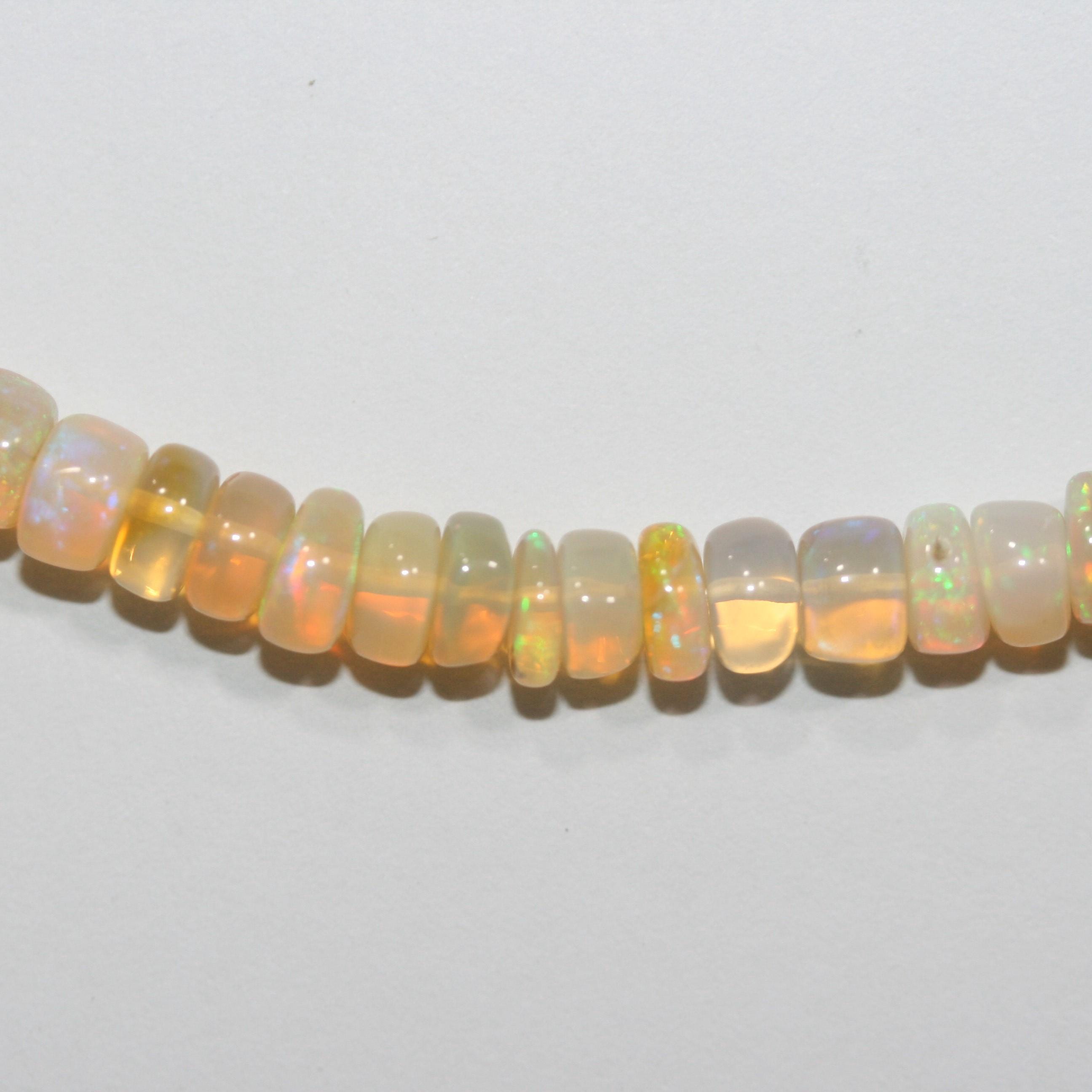 Cuentas redondas lisas de ópalo etíope de San Etiopía de 40 cm, 6 x 3 mm (aprox.). Hilo de 40 cm.