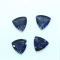 Lot d'iolites facettées taille trillion 8 mm (4 pièces).