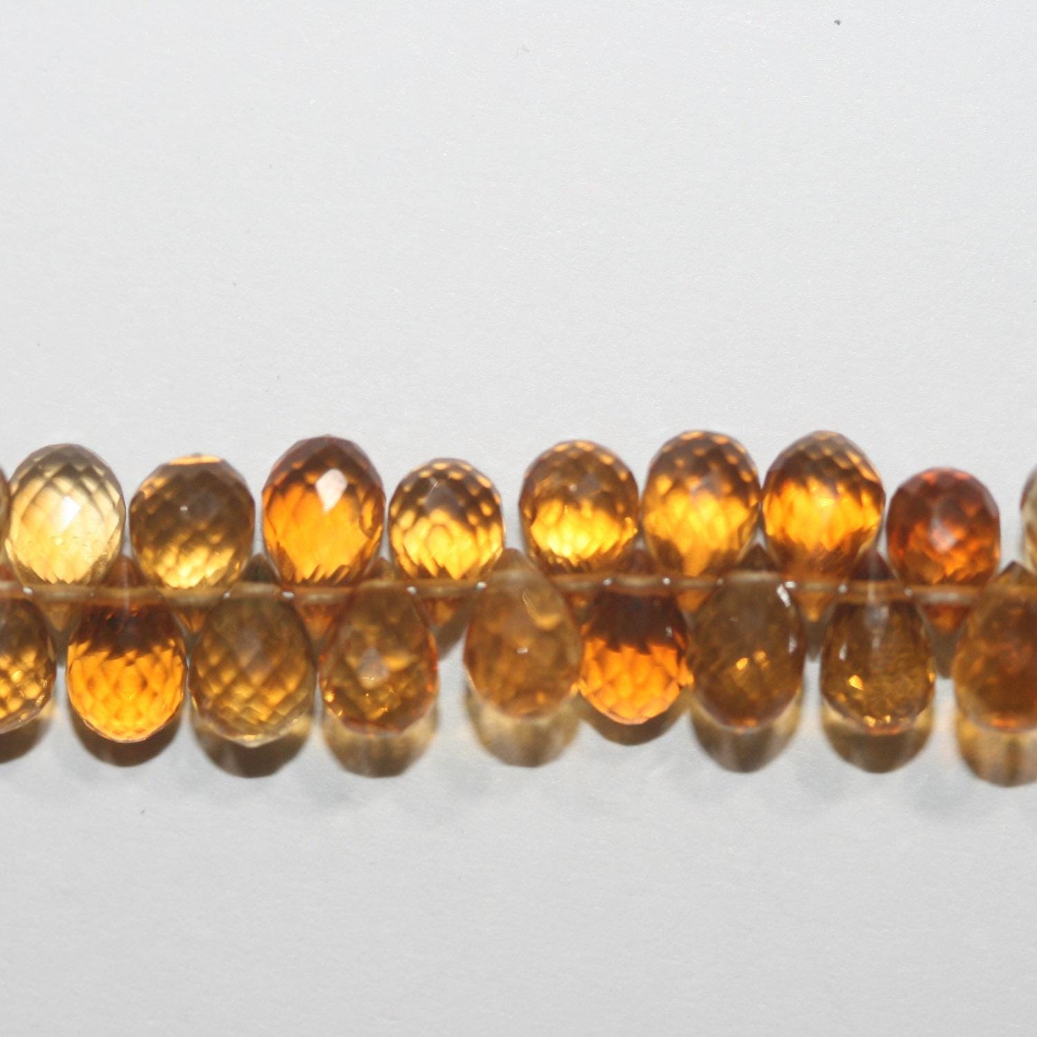 Perles en citrine St de taille dégradée, en forme de goutte, à facettes, de 7,5 x 4,5 mm à 5 x 3,5 mm environ. Longueur du fil : 20 cm. Perles de créateur en pierres précieuses.