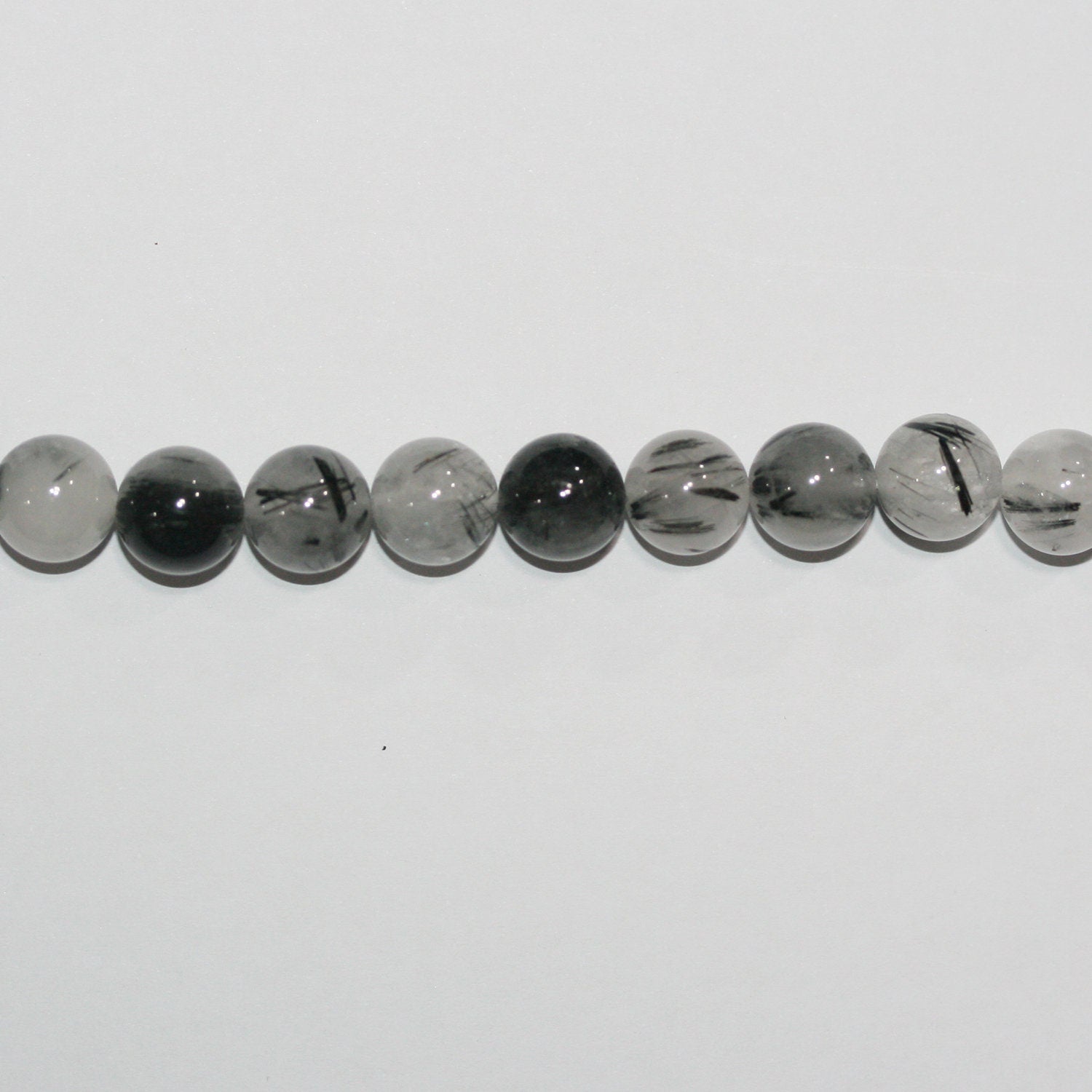 Cuentas redondas lisas de cuarzo turmalinado de 16" (16 mm) - Hilo de 40 cm