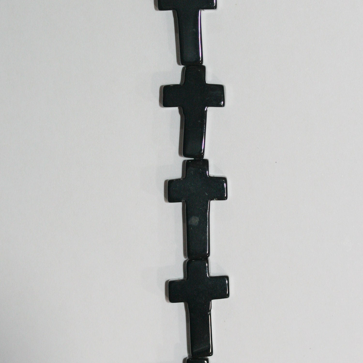 16" Cuentas Cruzadas Lisas de Ónix Santo 20x12mm.-Hilo 40cm.