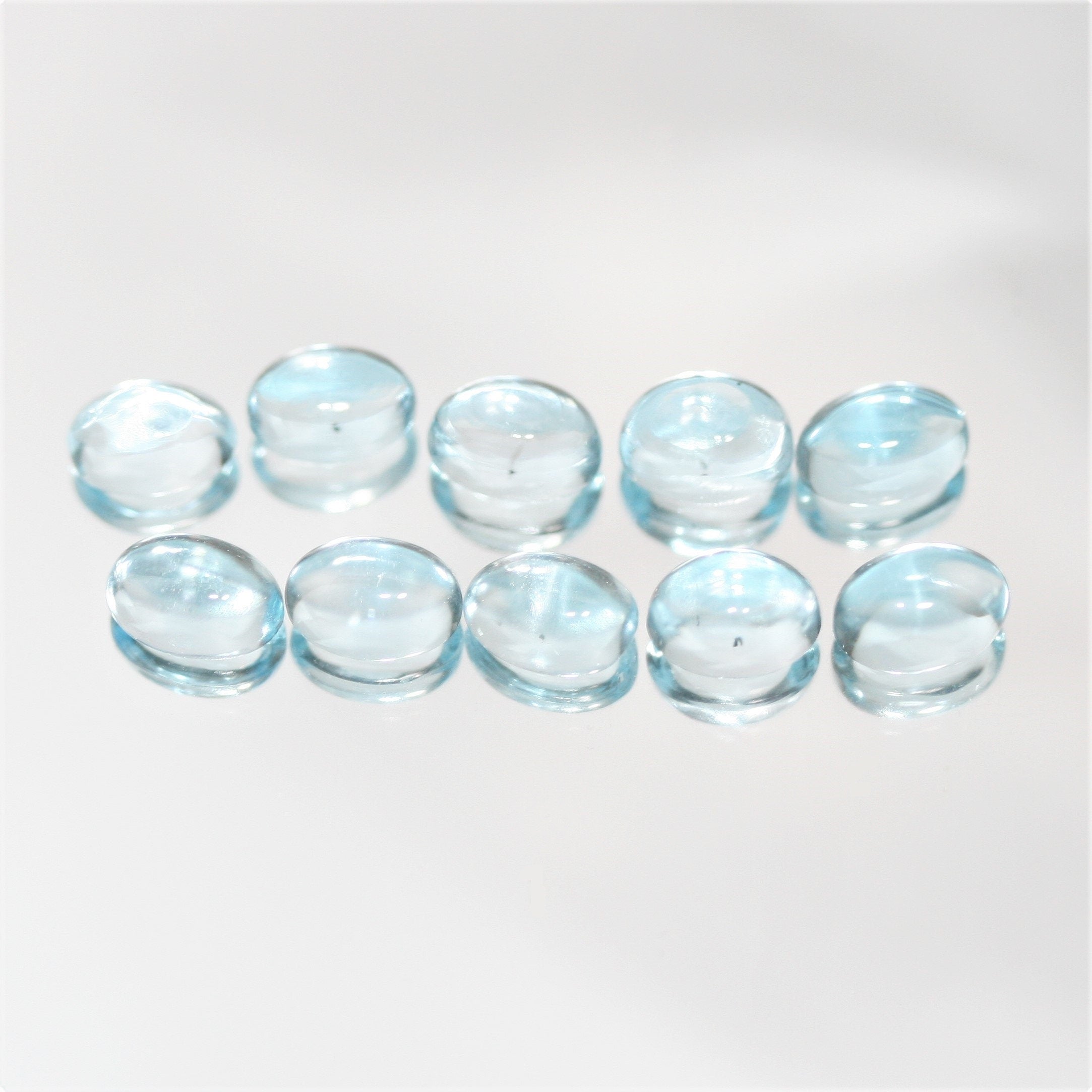Sky Blue Topaz Smooth Oval Cabochons Lot 7x5mm.- 10 Pieces