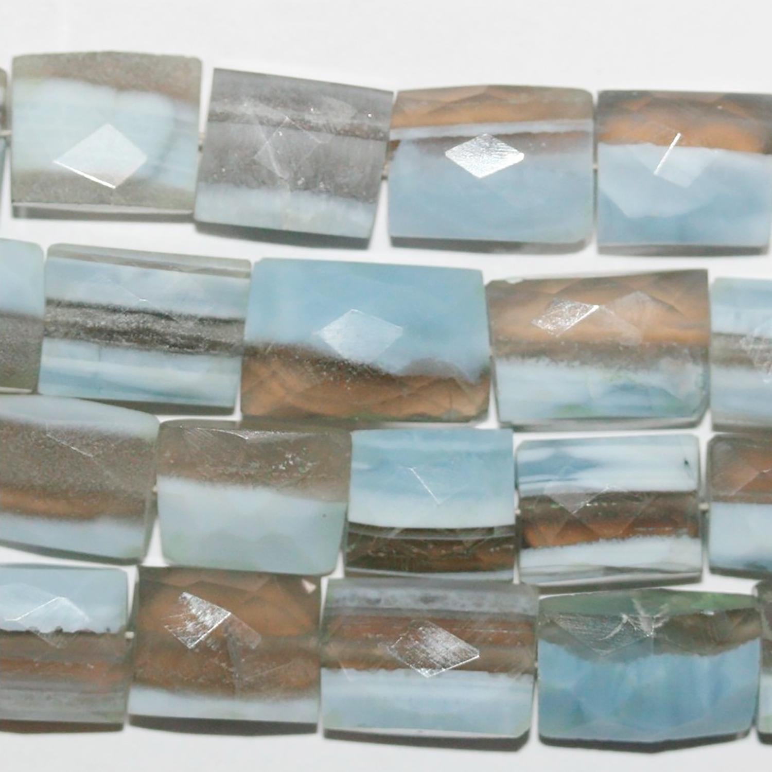 Cuentas rectangulares facetadas de ópalo azul de 8" (12 x 8 mm). Tira de 20 cm aprox.