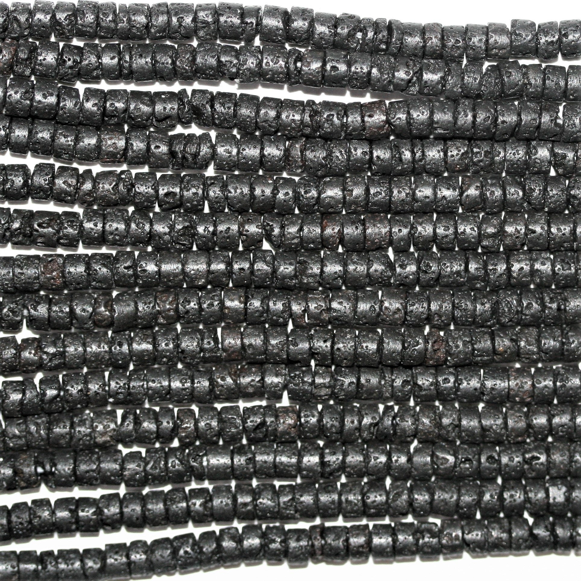 Perles rondelles lisses St. Lava 15" 4x2mm.- Brin 39cm.