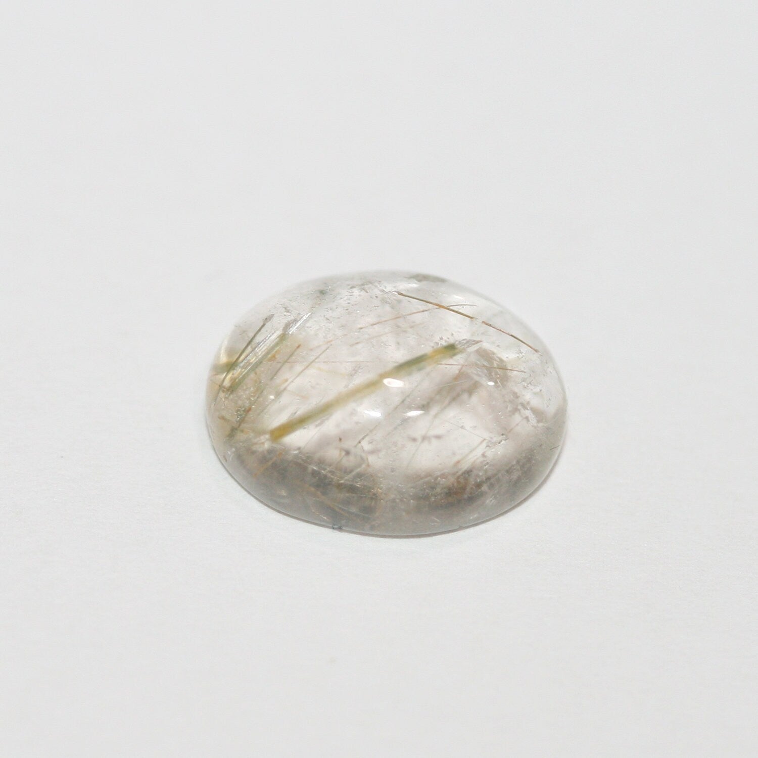 Lote de 6 cabujones ovalados de cuarzo rutilado de 12 x 10 mm. (6 uds.)