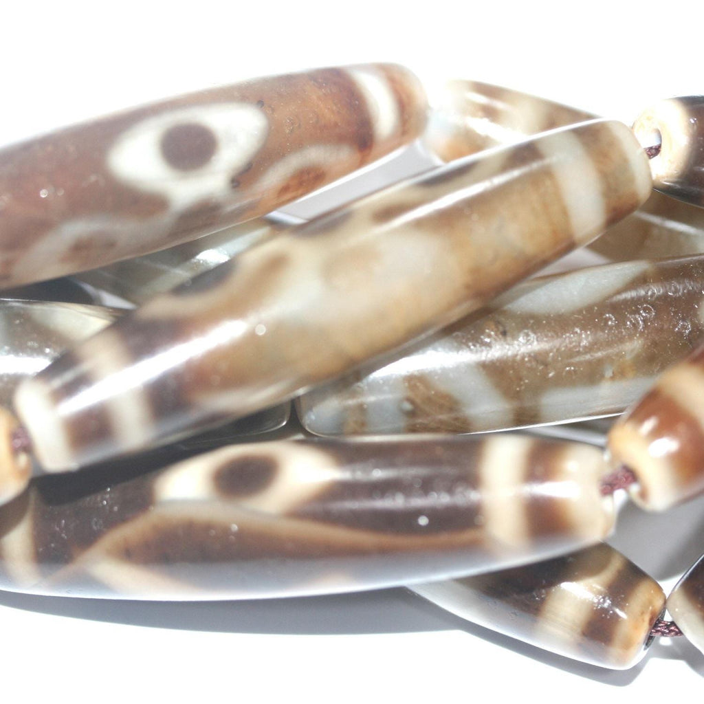 Cuentas de barril liso de ágata marrón de 16", 57 x 13 mm aprox. - Hilo de 40 cm.