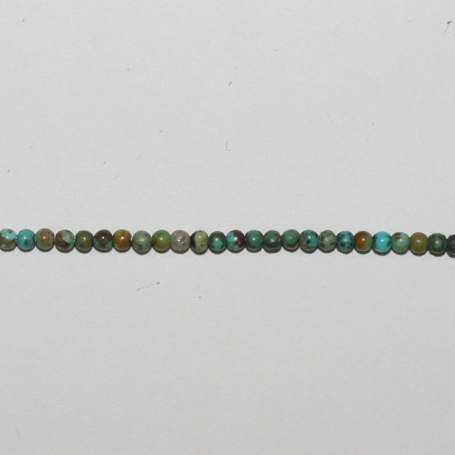 Perles rondes lisses en turquoise St 15" 1,8 mm.-Rig 39 cm.