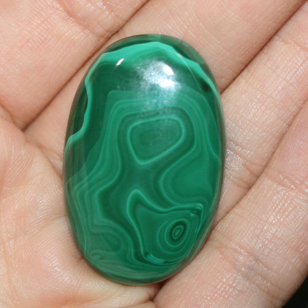 Malachite Oval Smmoth Cabochon 36x23mm.(62.51ct)