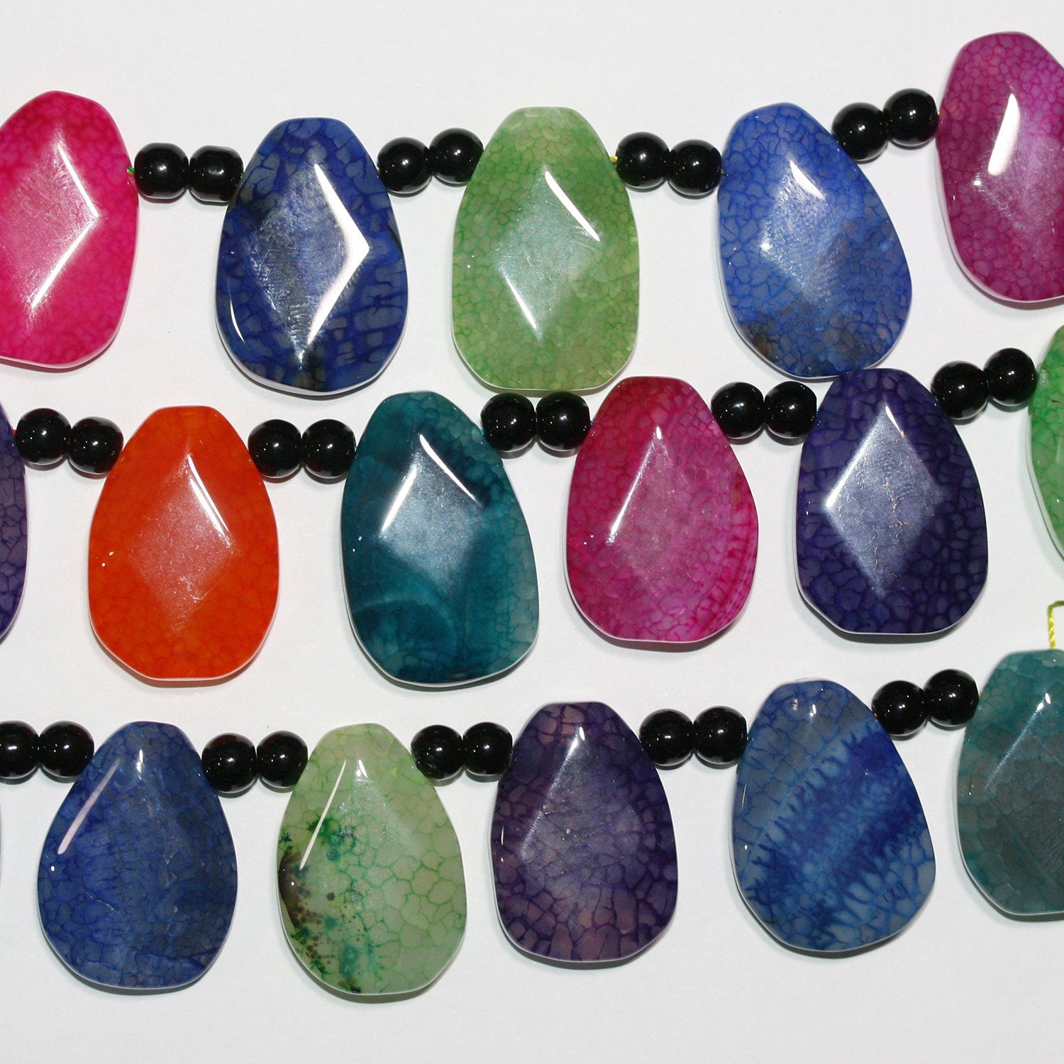 Cuentas de ágata multicolor facetadas de 16" 30 x 20 mm - Hilo de 40 cm.