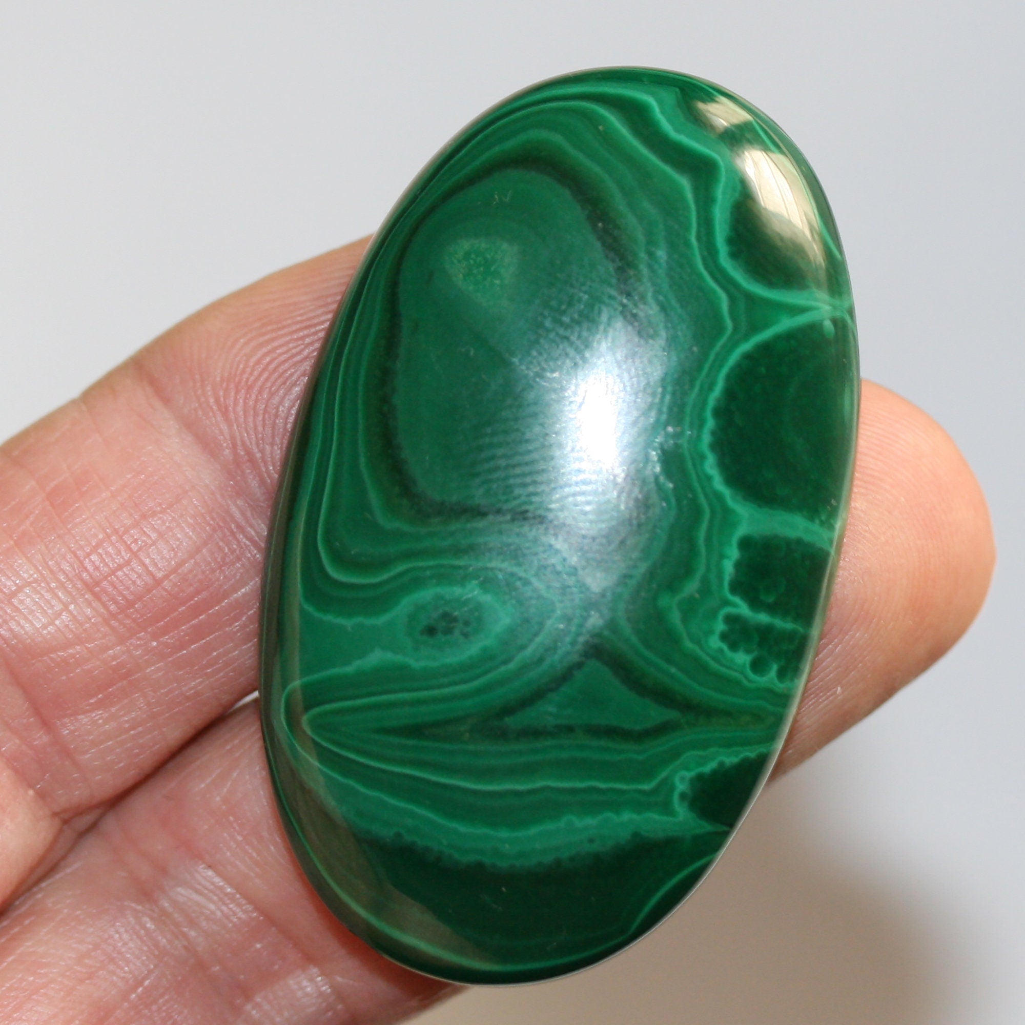 Malachite Oval Cabochon 54x32.5mm.(171.4ct)