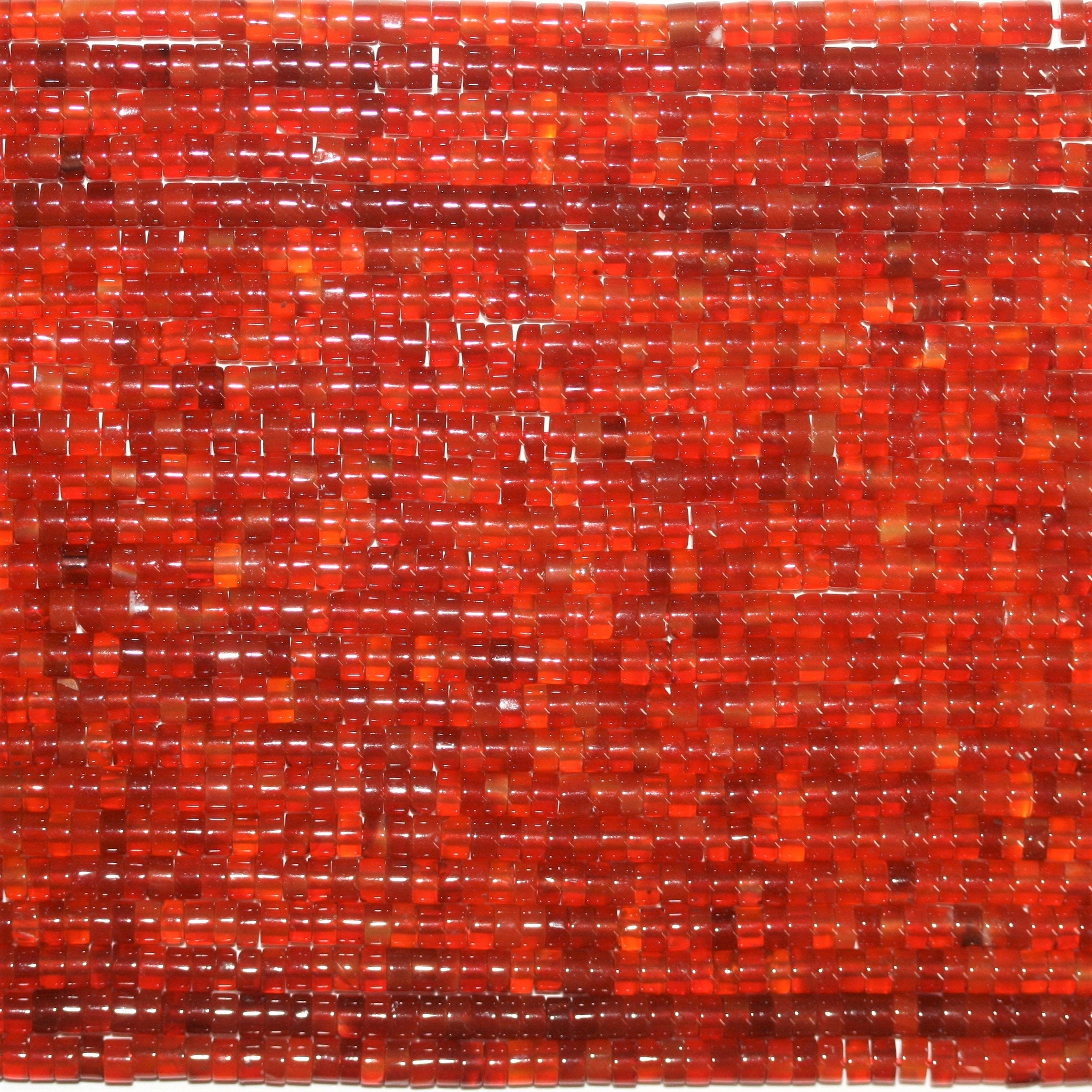 Perles disques lisses en cornaline St 15" 4x2mm.- Brin 39 cm.