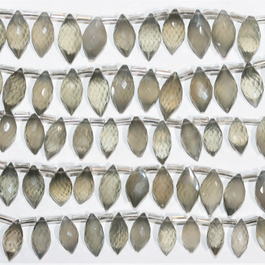 Cuentas de piedra lunar gris St. facetadas de 7", 12 x 7 mm. Aprox. - Hilo de 18 cm.