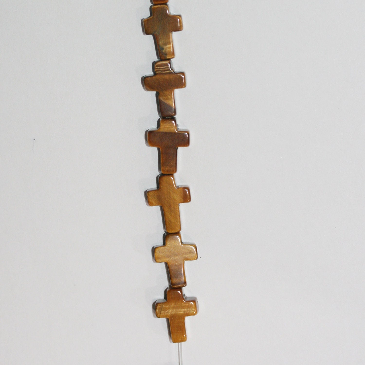 16" Cuentas de Cruz Lisa de Ojo de Tigre 14x10mm.-Hilo 40cm.