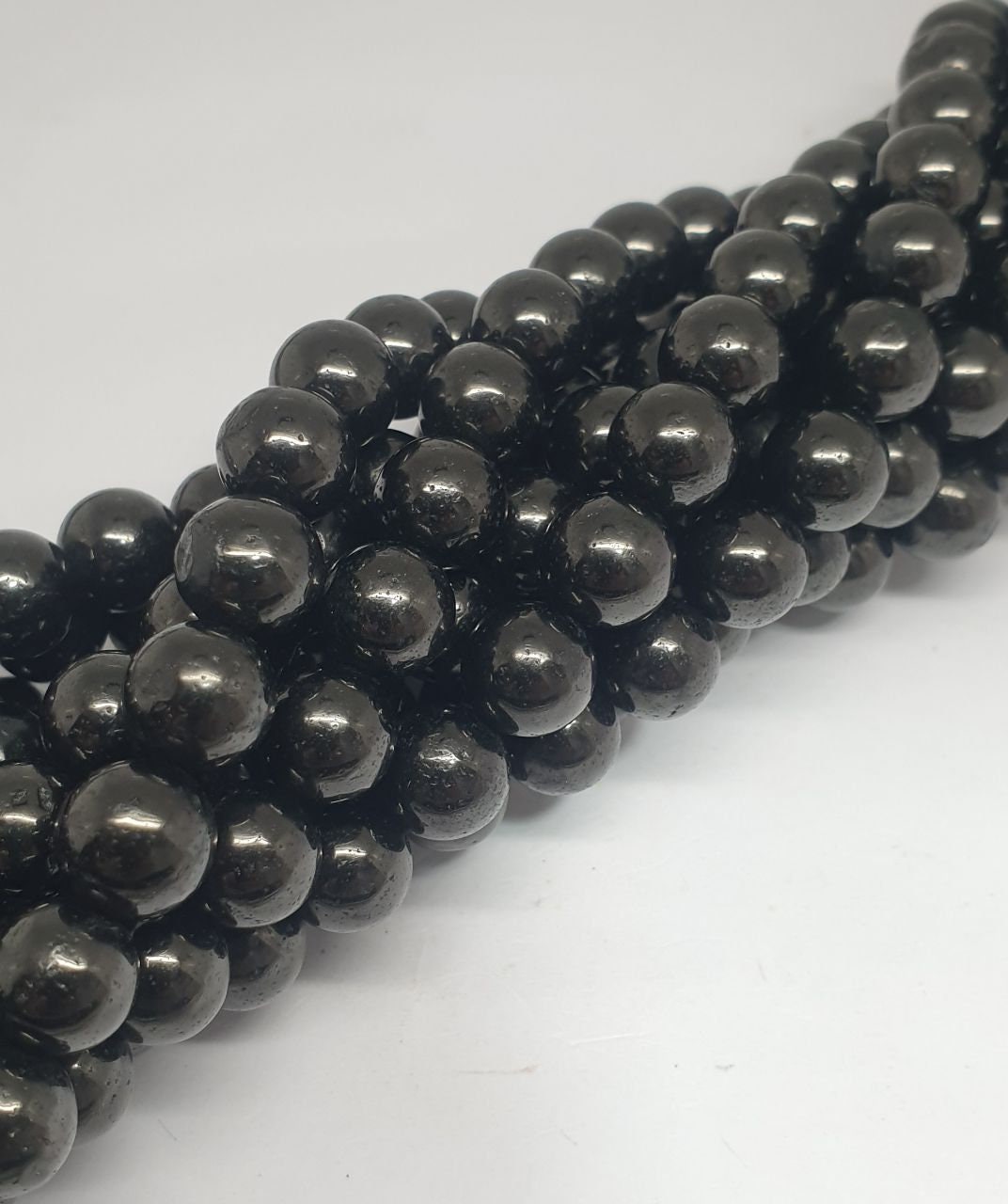 Brin de perles rondes en lignite naturelle de 8 mm, longueur 40 cm (15 pouces).