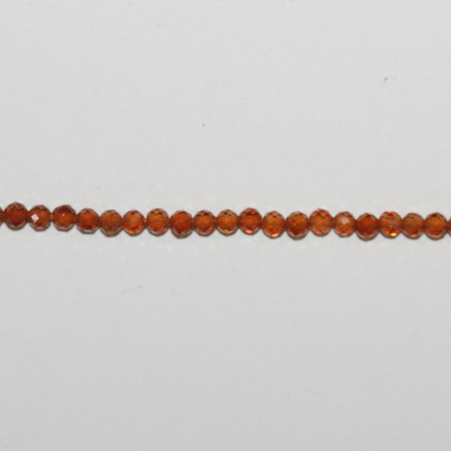 13" St Hessonite Garnet Faceted Round Beads 3mm.-Strand 39cm