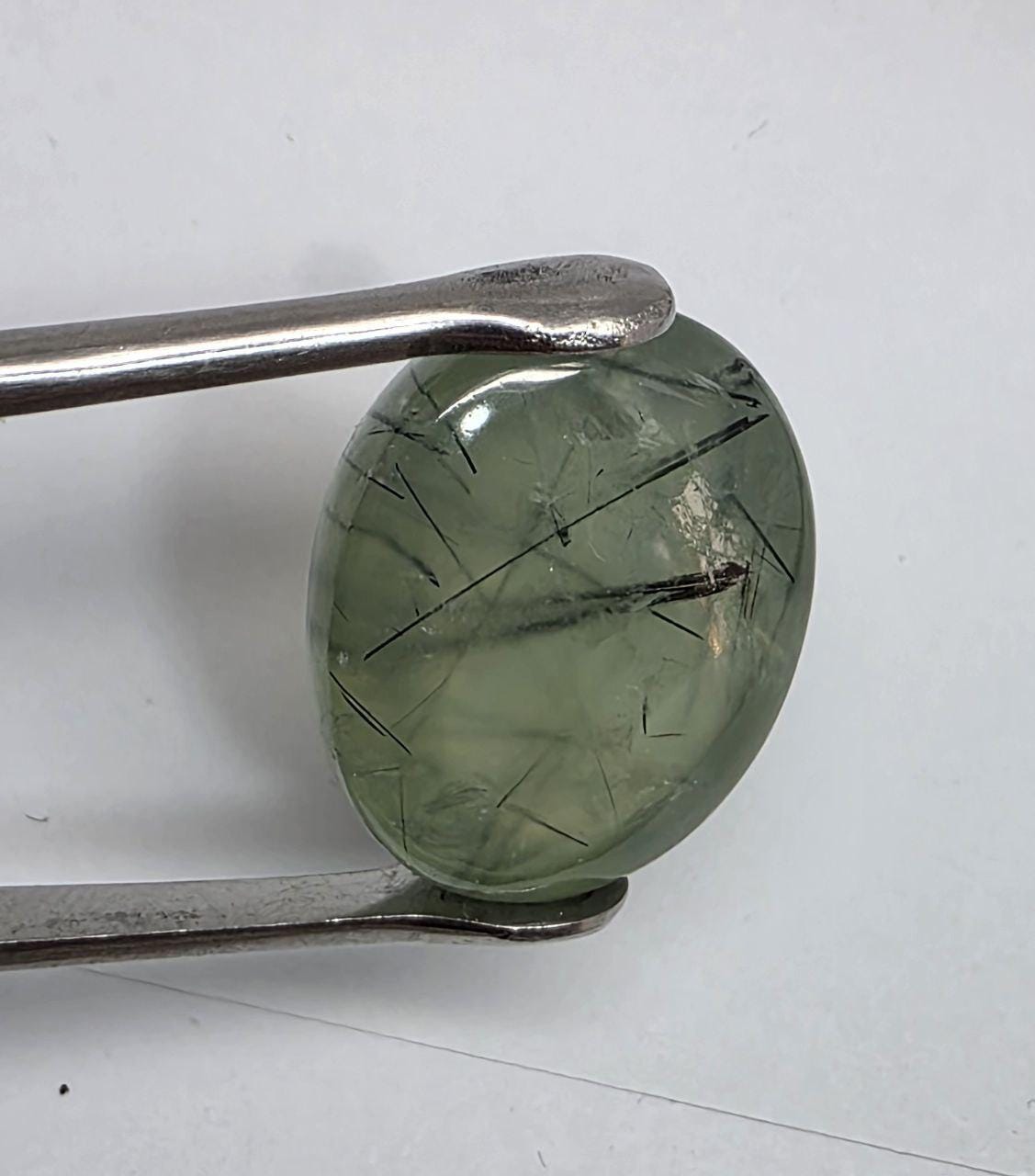 Big Prehnite Smooth Oval Cabochon 24.4x21.16mm.-(51.5ct)