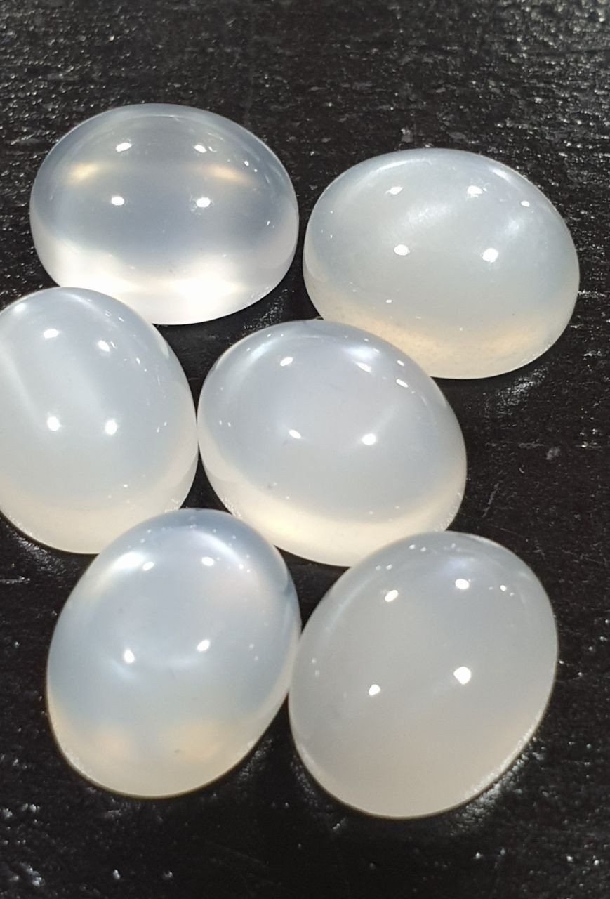 Lote de 6 cabujones ovalados de piedra lunar blanca de 11 x 9 mm. (6 uds.)