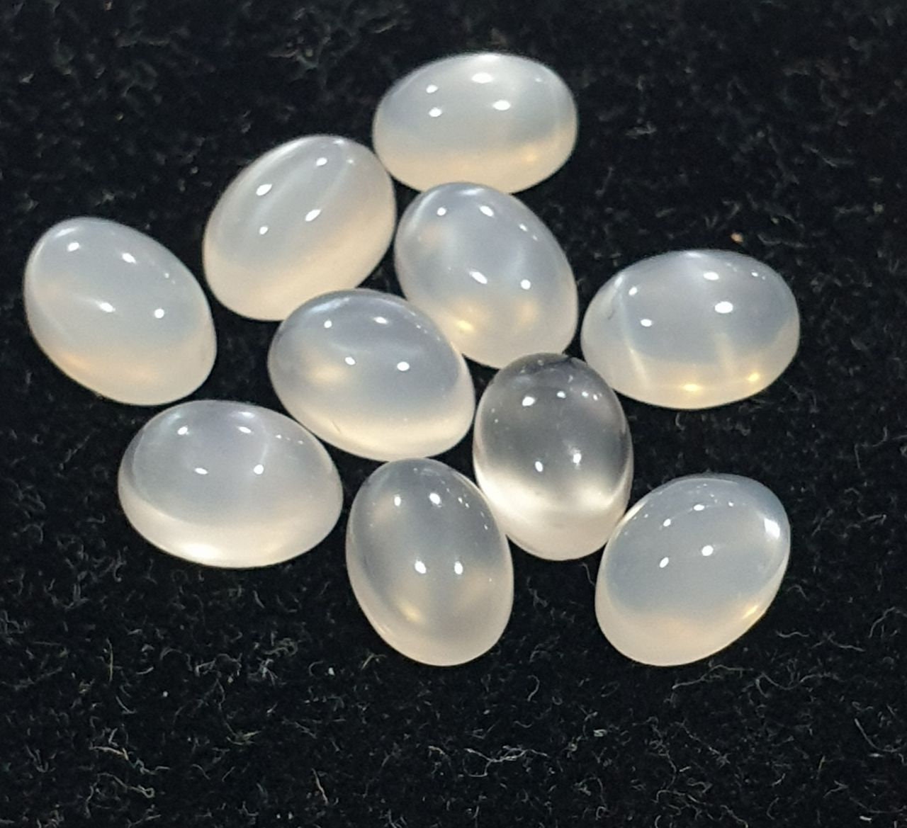 10 Pcs Lot White Moonstone Oval Cabochon 7x5mm. (10 pcs.)