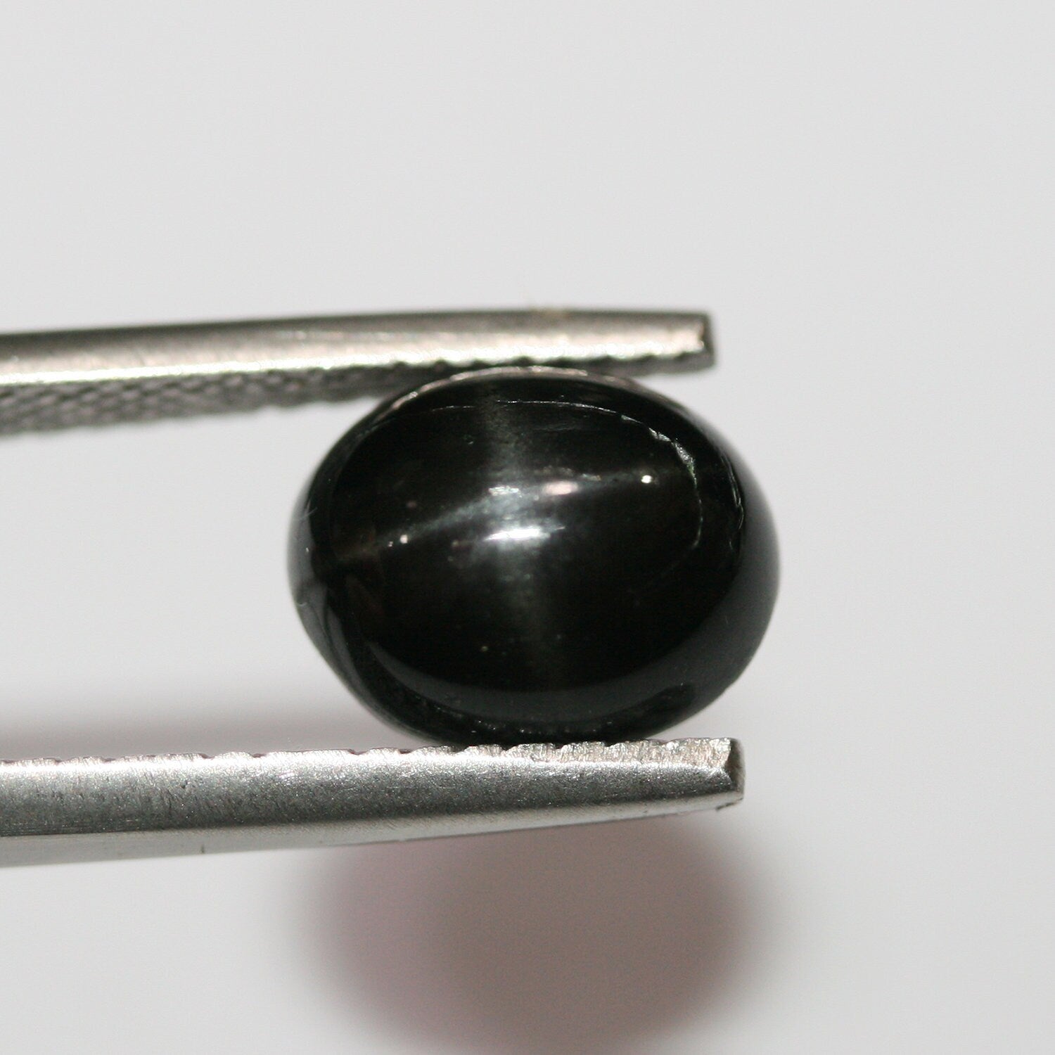 Lote de 6 cabujones ovalados de diópsido estrella de 10 x 8 mm. (6 uds.)