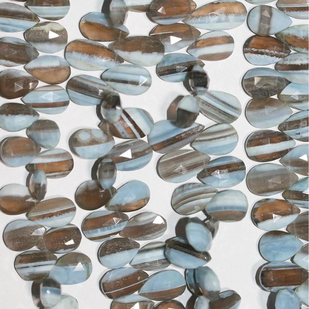 Cuentas de ópalo azul facetado de 8" de St., 16 x 10 mm, aprox. - Hilo de 20 cm.