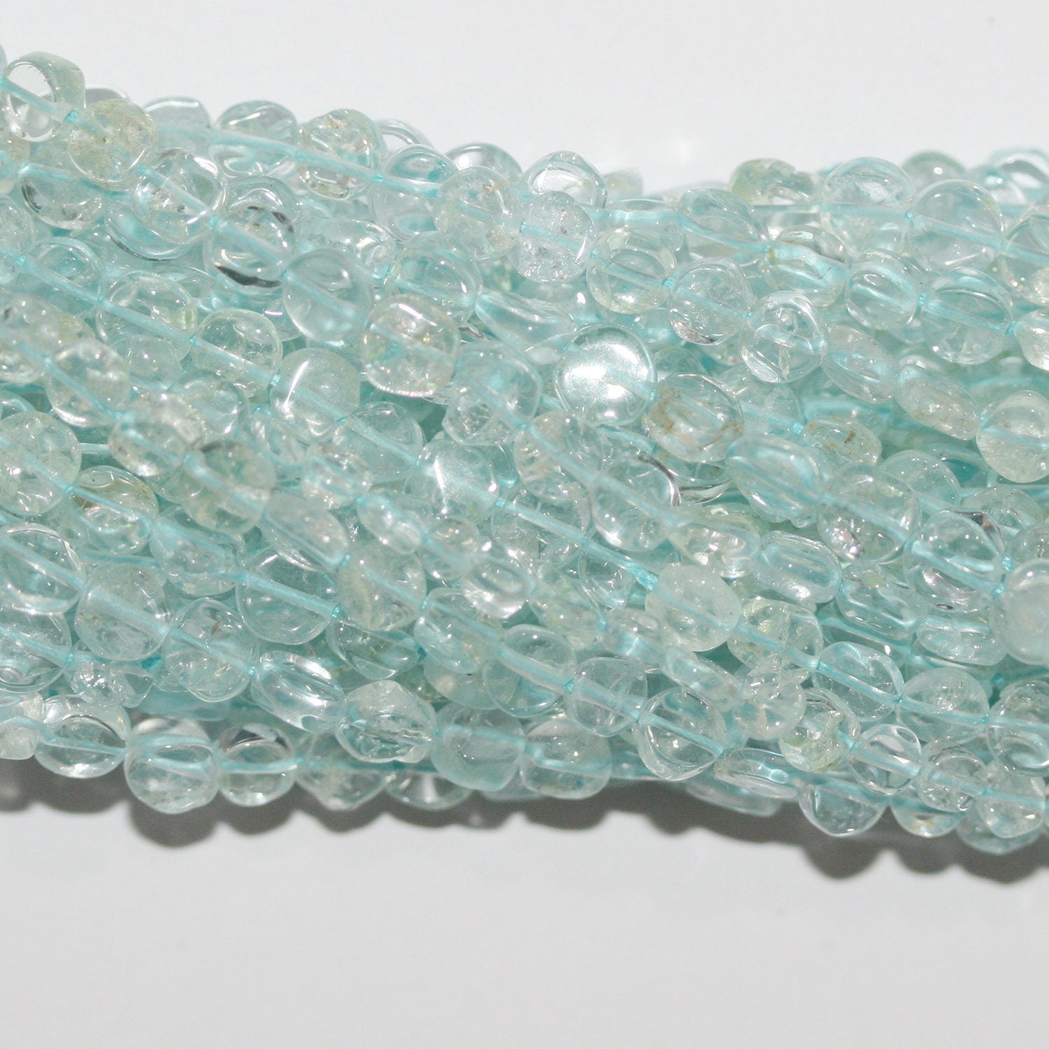 14" St Aquamarine Smooth Coin Beads 4-5mm.Approx.-Strand 37cm.
