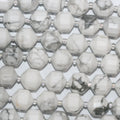Perles cylindriques à facettes en howlite blanche St 14" 10x9mm.-Rig 38cm.