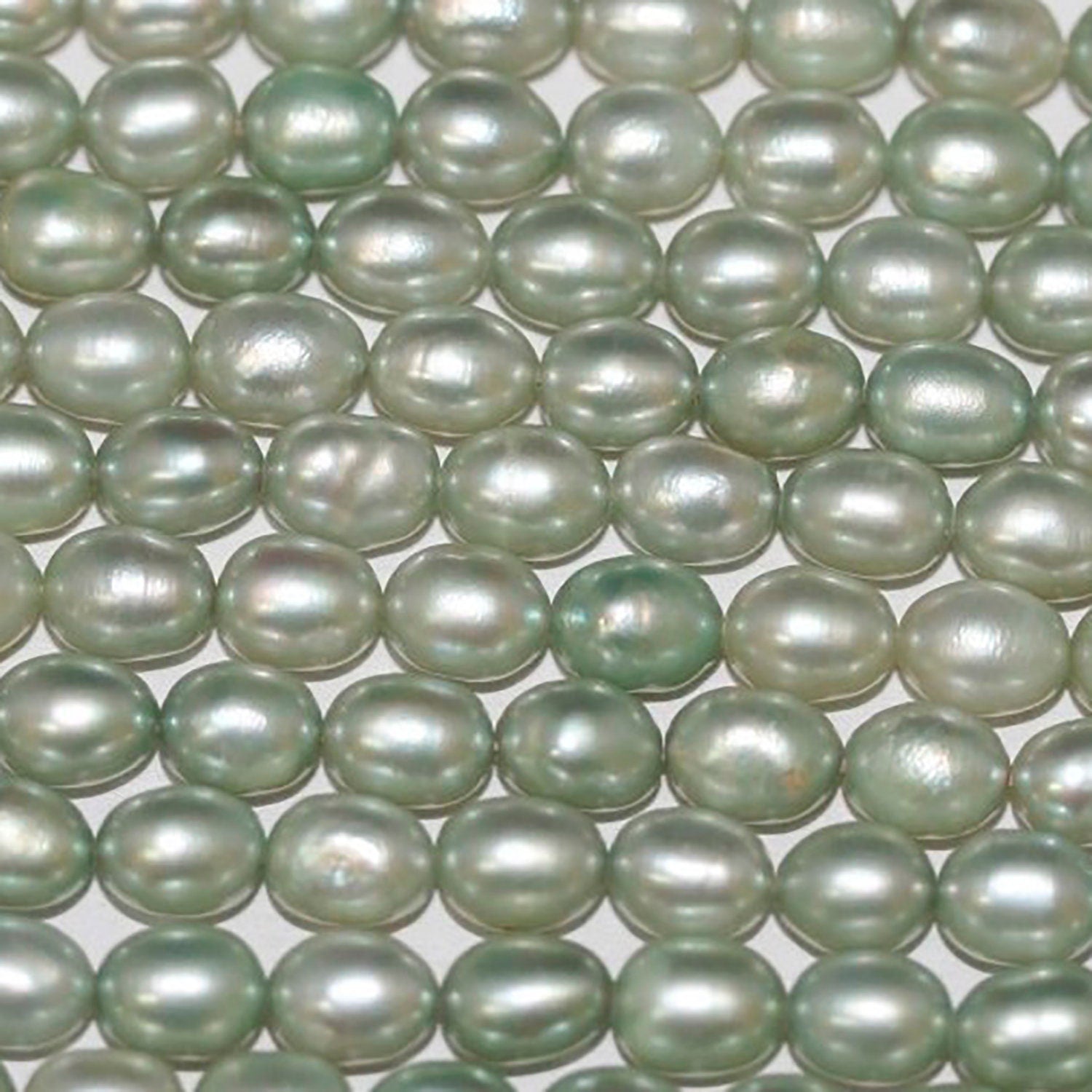 Perles ovales vertes d'eau douce 16 pouces (40 cm) - 6 x 4 mm - Fil de 40 cm - Perles naturelles - Prix de gros