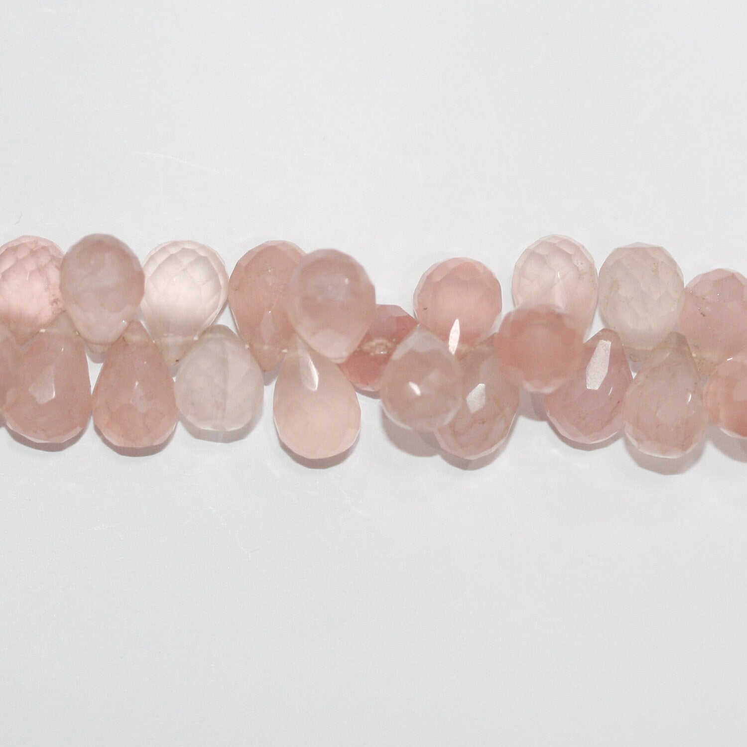 Perles en quartz rose facettées de 8 pouces (12 x 8 mm). Longueur du fil : environ 21 cm.