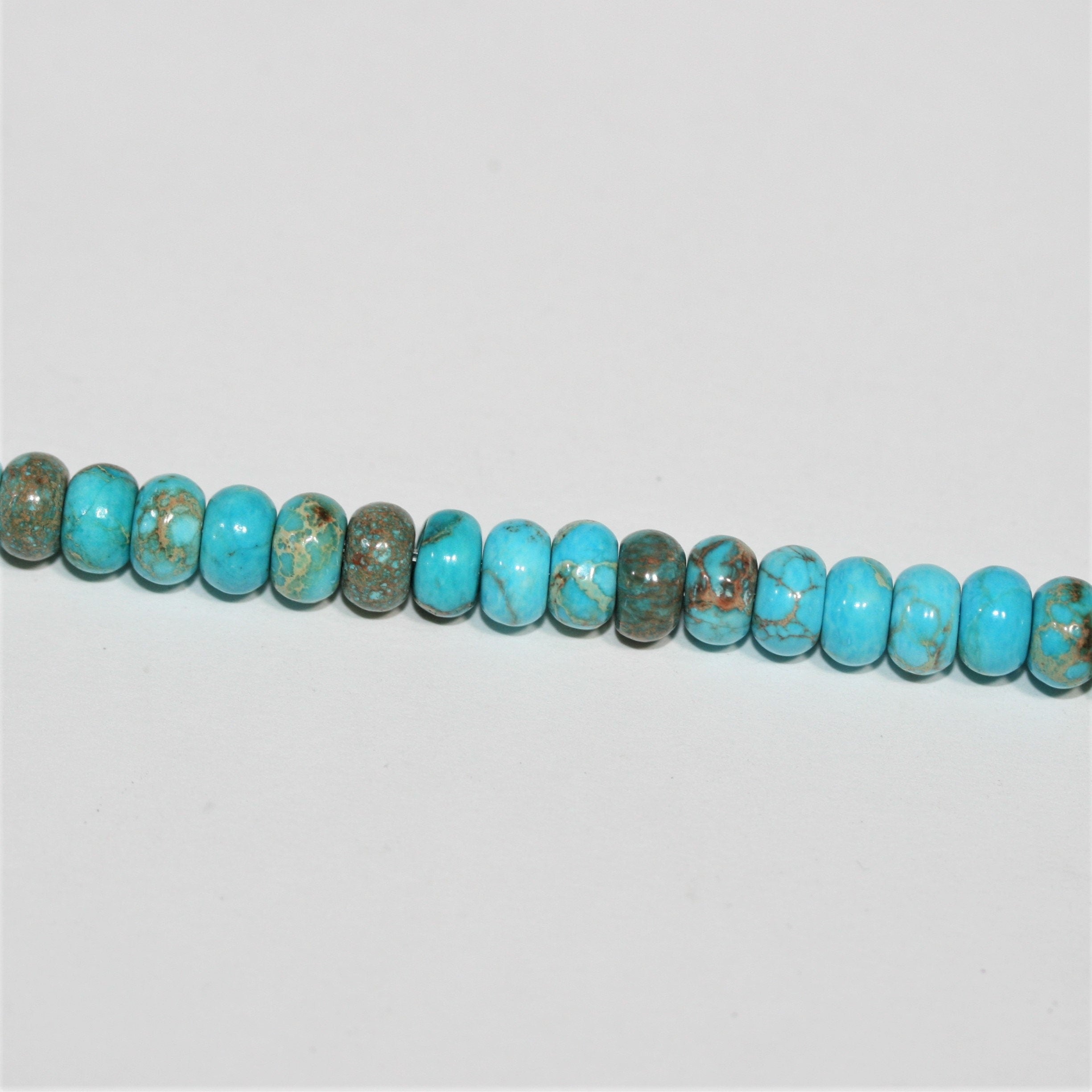 Cuentas redondas lisas de turquesa St. de 16" de 6 x 4 mm - Hilo de 41 cm.