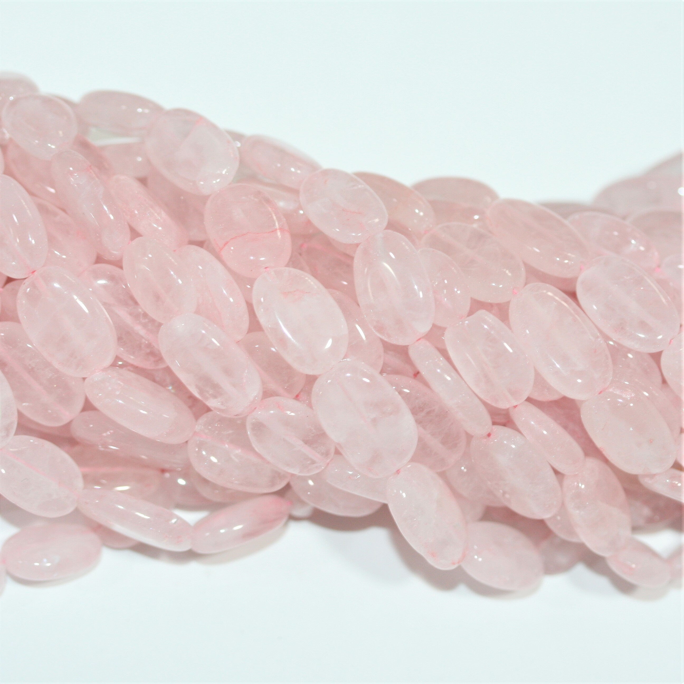 13" St Rose Quartz Smooth Oval Beads 14x9mm. Approx.- Strand 33cm.