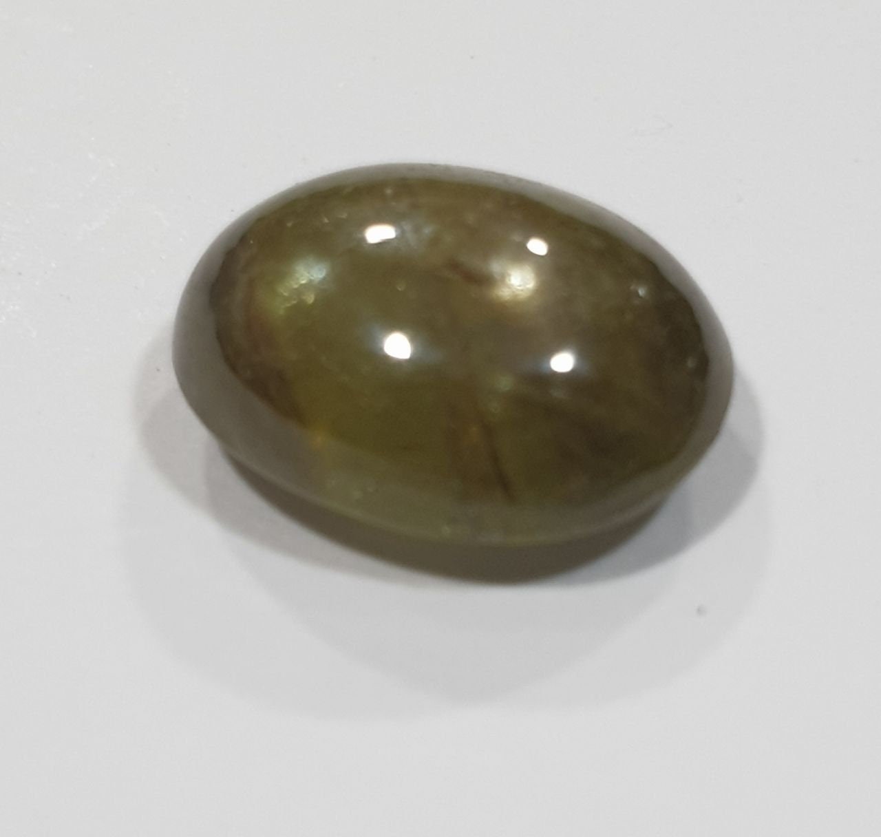 Green Sapphire Oval Cabochon 11.7x9mm.(5.7ct.).