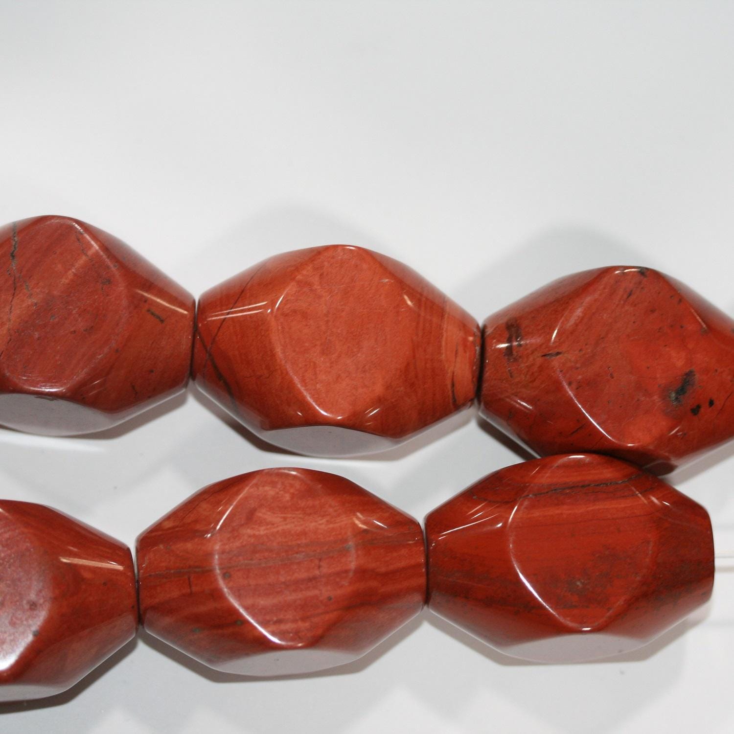 12" St Red Jasper Barrel Faceted Beads 40x25mm.-Strand 36cm