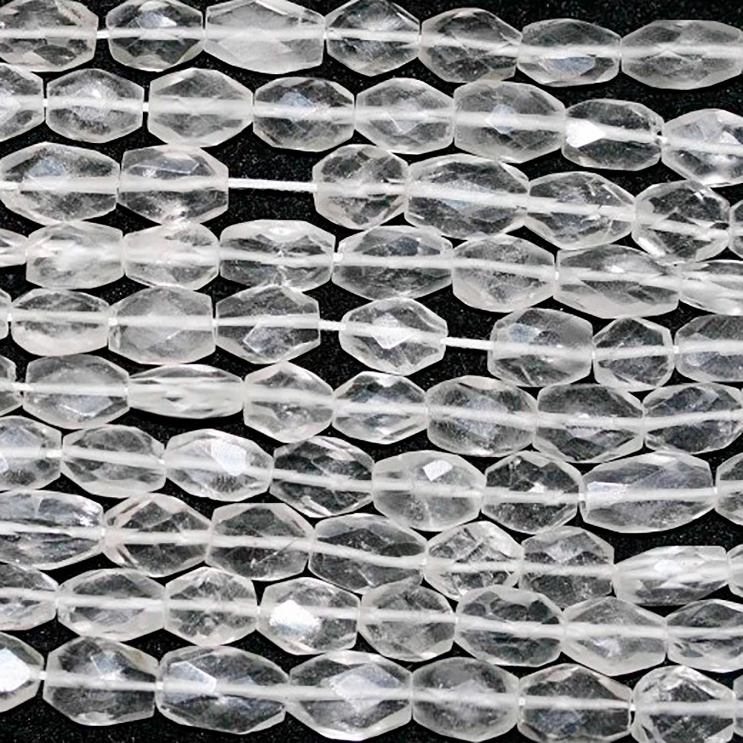 Perles ovales à facettes en cristal de roche St 14" (9 x 6 mm environ) - Longueur du fil : 37 cm