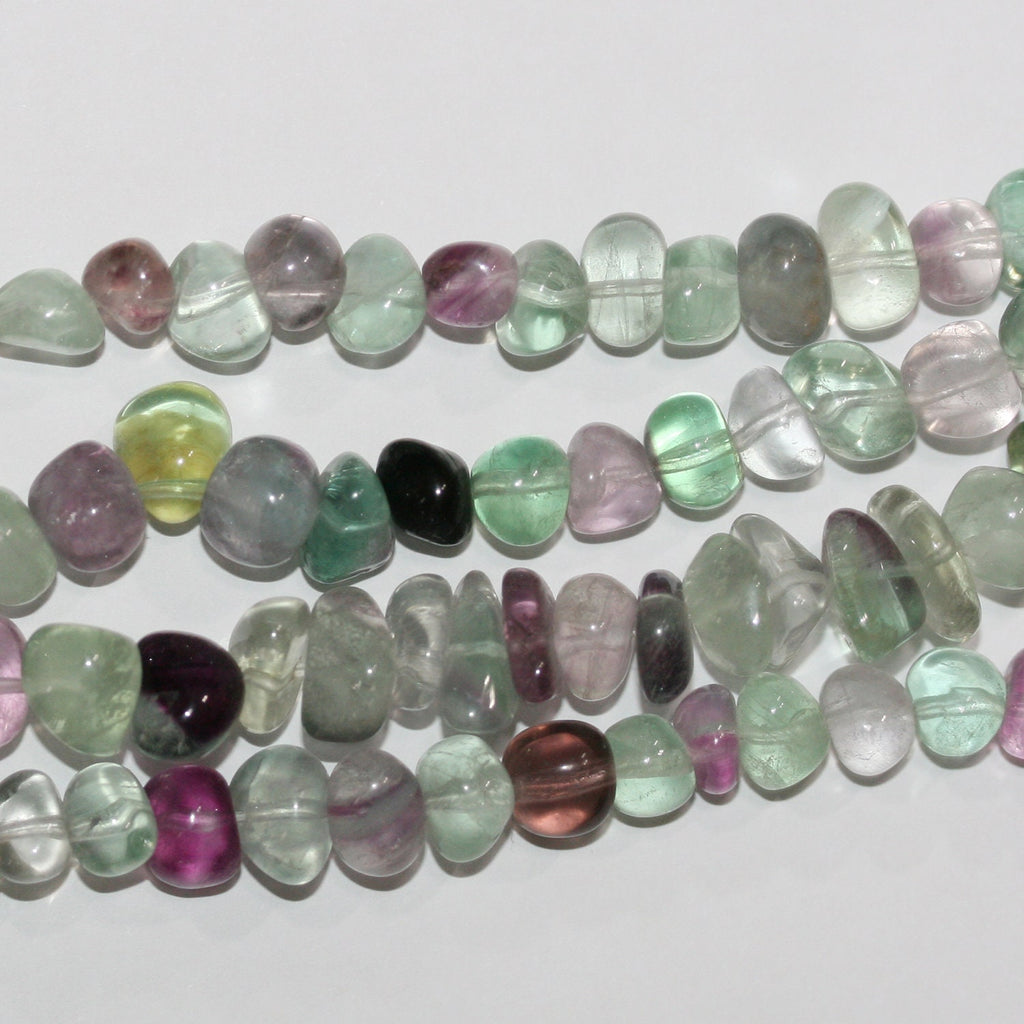 Perles de fluorite St lisses en pépites de 15 pouces (8-10 mm). Longueur approximative du fil : 39 cm.