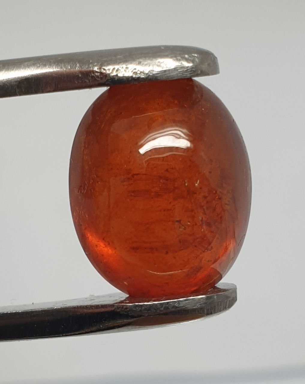 Spessartine Garnet Oval Cabochon 13x10.4mm. (10.34ct.).