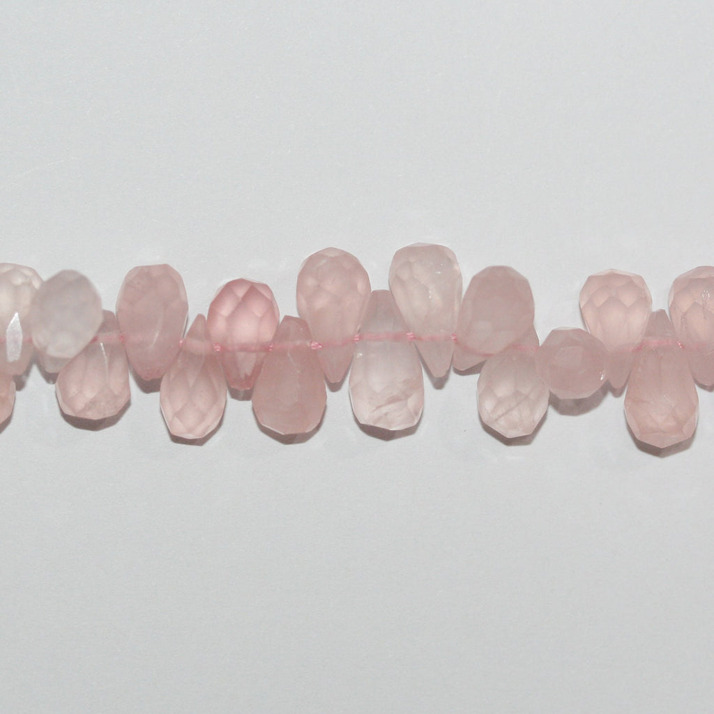 Cuentas de cuarzo rosa facetadas de 14" (9 x 6 mm). Longitud aproximada: 37 cm.