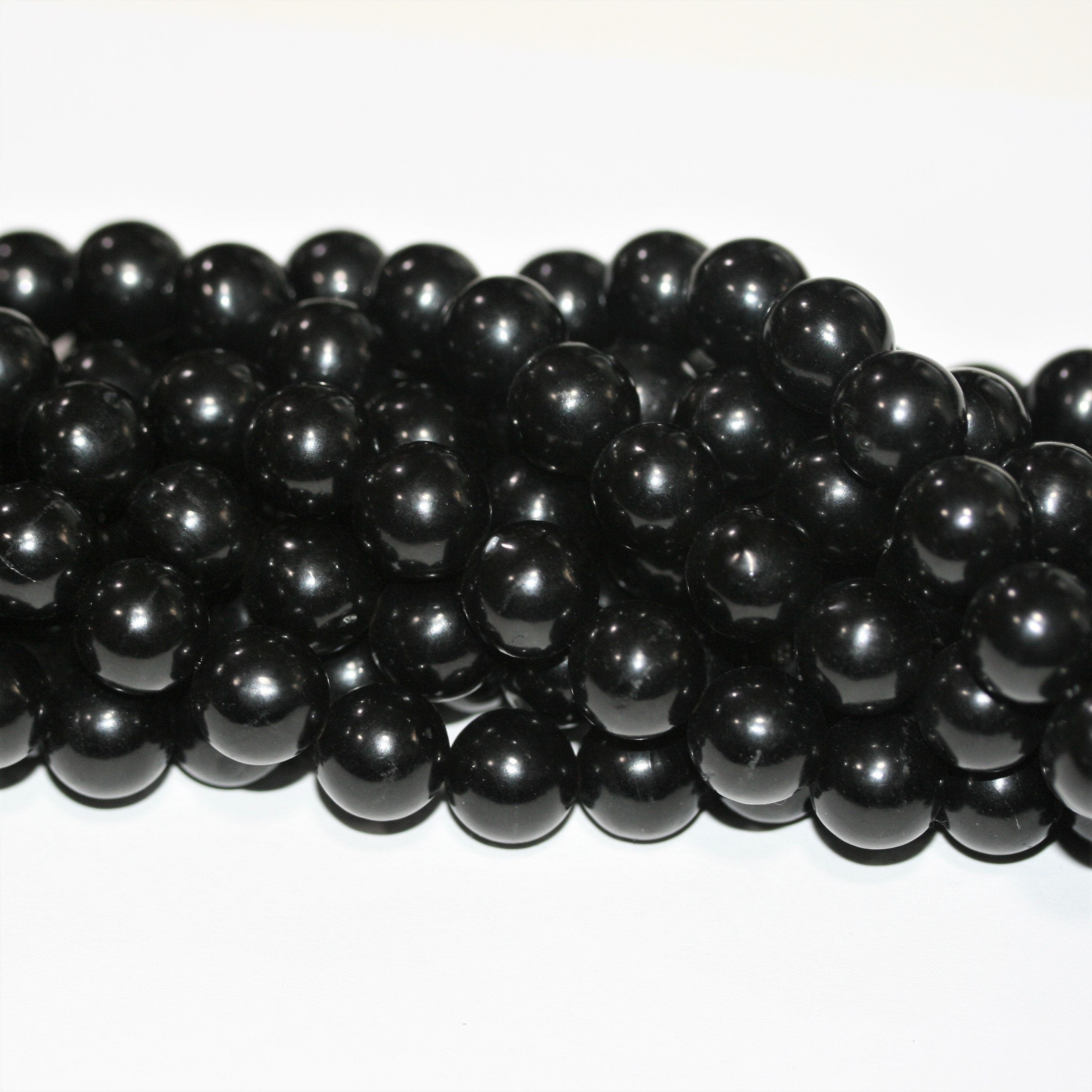 Perles rondes lisses Jet 12 mm - Fil de 40 cm.