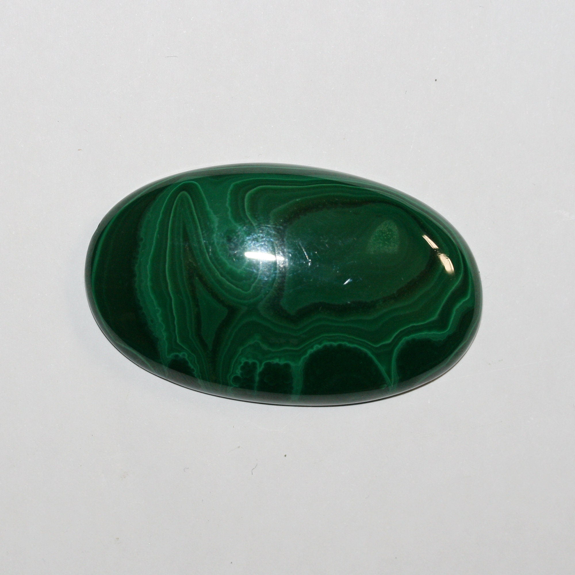 Malachite Oval Cabochon 54x32.5mm.(171.4ct)