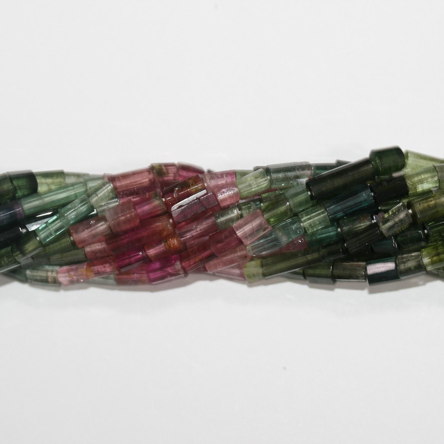 Perles tubulaires à facettes en tourmaline St de 14 pouces, 7 x 4 mm. - Longueur approximative : 37 cm.