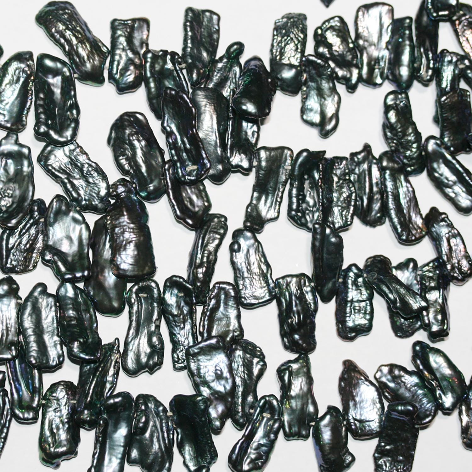 Perle Biwas noire d'eau douce St 16" St 20x9mm. Longueur approximative : 40 cm